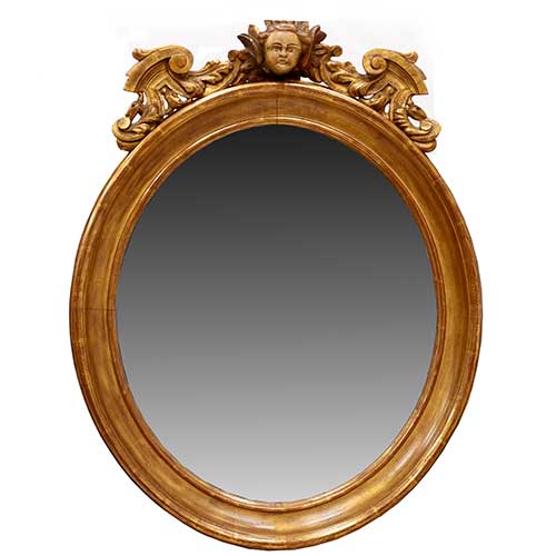 Sub.:34 - Lote: 137 -  Espejo ovalado con cabeza de �ngel en el copete