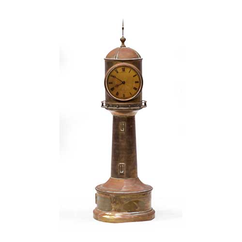 Sub.:34 - Lote: 264 -  Reloj en forma de faro en lat�n