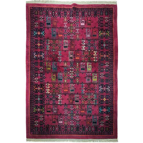 Sub.:34 - Lote: 289 -  Alfombra persa en lana con decoraci�n geom�trica sobre campo rojo