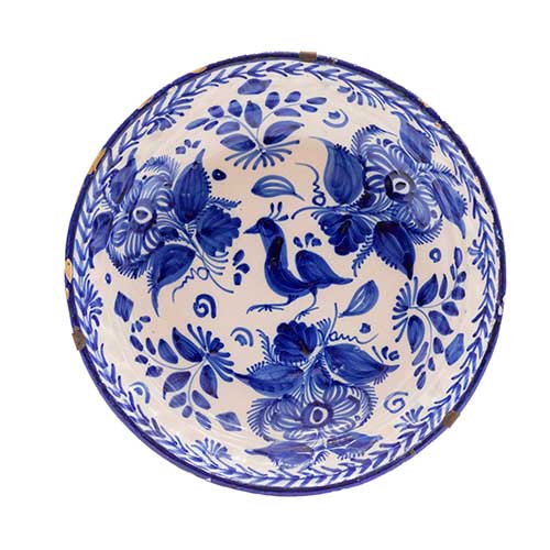 Sub.:36 - Lote: 346 -  Plato azul y blanco con motivos florales y p�jaro en cer�mica de Manises siglo XIX