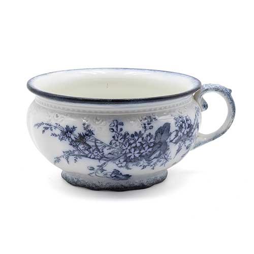 Sub.:36 - Lote: 257 -  Orinal en ceramica con decoracion floral en gris azulado