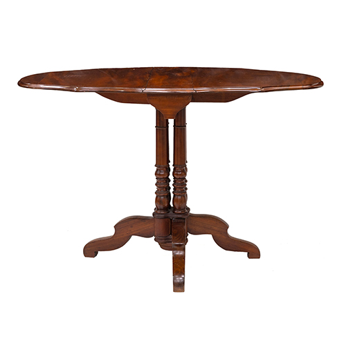 Sub.:37 - Lote: 1284 -  Mesa de alas en caoba con patas torneadas plegables siglo XIX