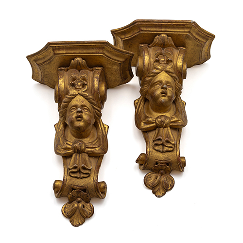 Sub.:37 - Lote: 341 -  Pareja de m�nsulas modelo Regencia en madera tallada y dorada, S.XIX- XX