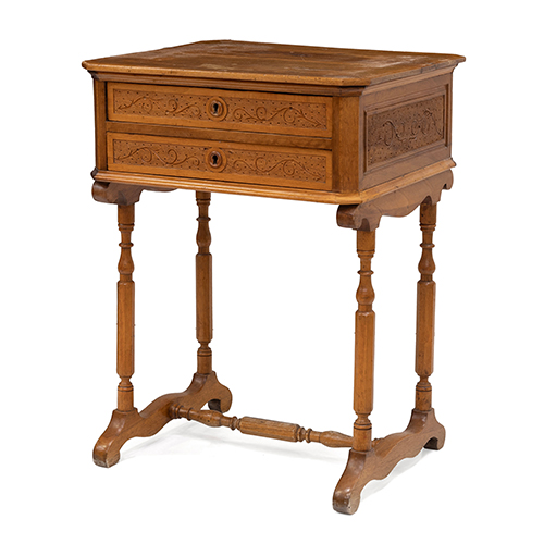 Sub.:38 - Lote: 337 -  Costurero Alfonsino en madera tallada y pies torneados.