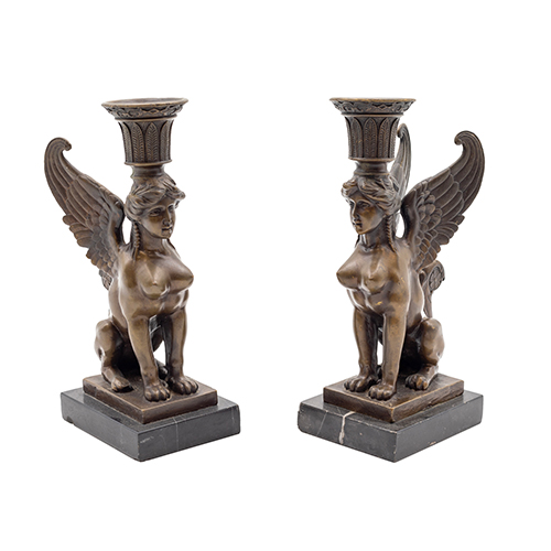 Sub.:38 - Lote: 1313 -  Pareja de candeleros con figuras de esfinges en bronce con base de m�rmol negro belga
