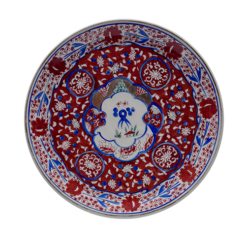 Sub.:38 - Lote: 1495 -  Plato en porcelana francesa con motivos orientales
