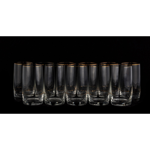 Sub.:4 - Lote: 1458 -  Conjunto de once vasos altos. En cristal con filo dorado.