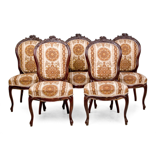 Sub.:4 - Lote: 1306 -  Lote de cinco sillas isabelinas en caoba tallada, S. XIX, con decoraci�n de flores en el copete.