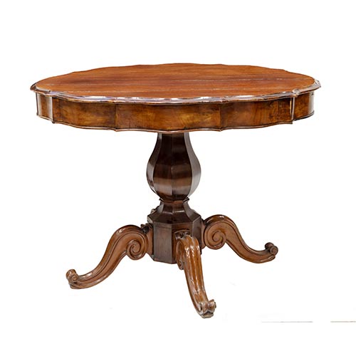 Sub.:7-On - Lote: 213 -  Mesa velador isabelina en madera de caoba. Pie central afacetado y rematado en cuatro patas .