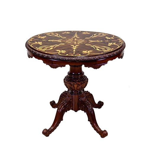 Sub.:7-On - Lote: 234 -  Mesa velador en madera tallada con trabajo de marqueter�a en la tapa, de pie central y cuatro patas.