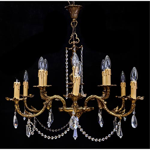 Sub.:7-On - Lote: 311 -  L�mpara de techo en bronce y cristal de doce luces. Con pinjantes de cristal.