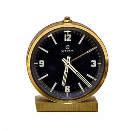 Sub.:8-On - Lote: 816 -  Reloj Cyma en metal dorado con esfera esmaltada con numeracin arbiga.