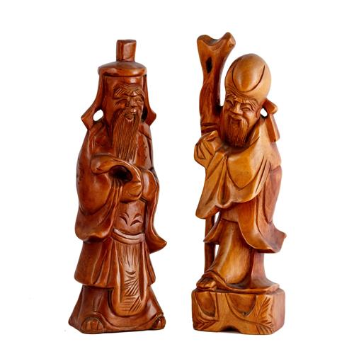 Sub.:8 - Lote: 3439 -  Pareja de personajes orientales en madera tallada.