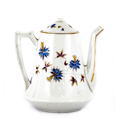 Sub.:8 - Lote: 3456 -  Tetera en porcelana blanca con decoraci�n de flores. 