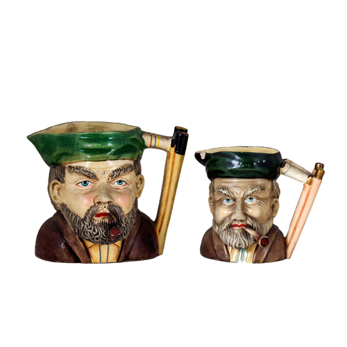 Sub.:8 - Lote: 3295 -  Lote de tres jarras en porcelana esmaltada. Una con piquete.